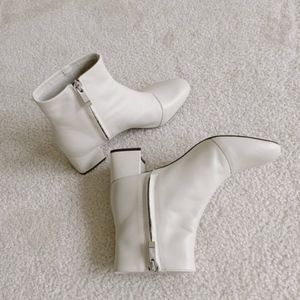 White Zara Booties. Just under 2 inches